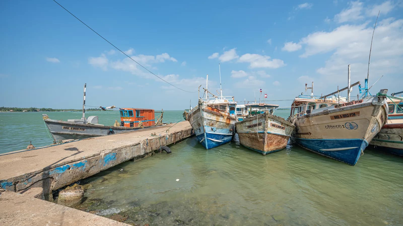Battalangunduwa island beach and fishing fleet