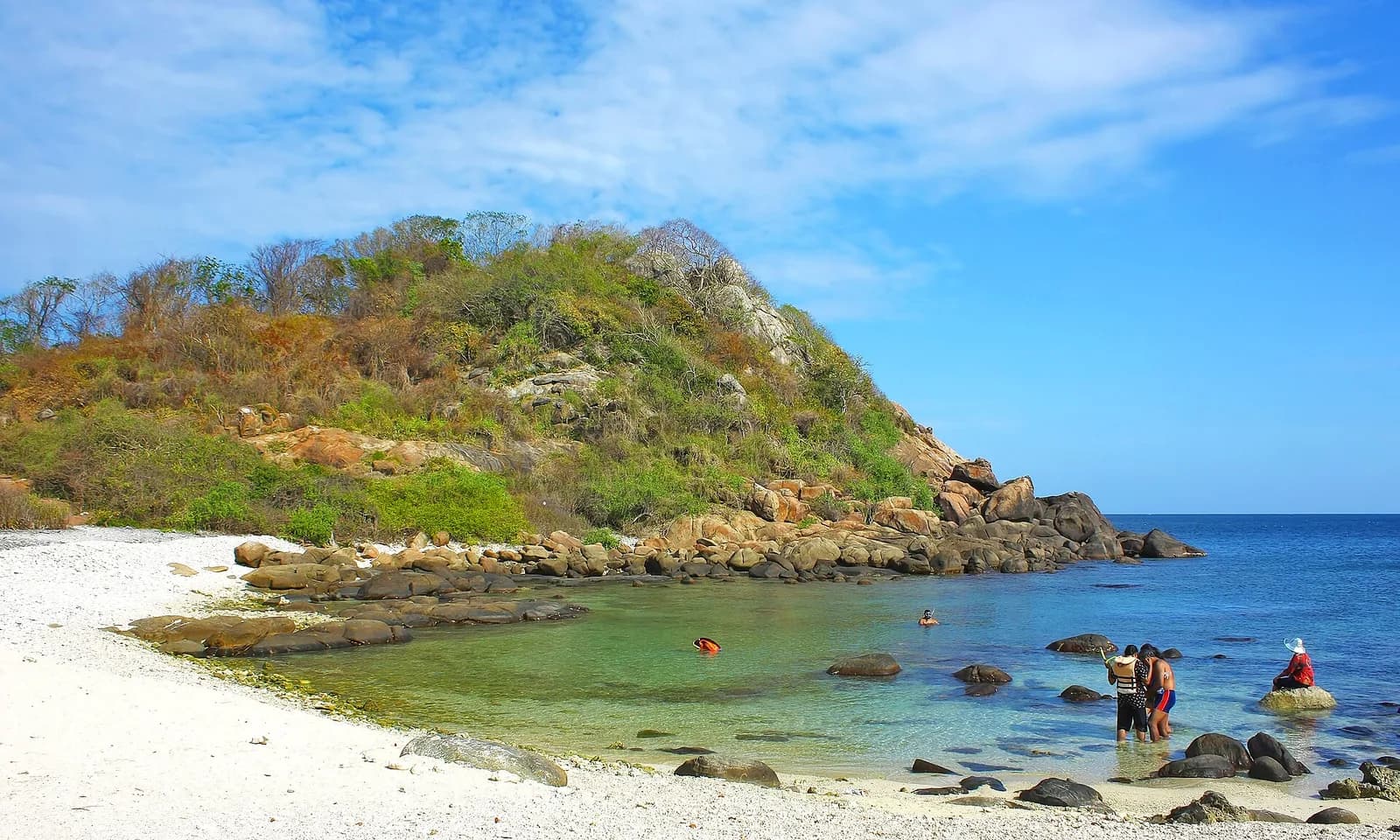 Snorkelling over colorful live coral reefs and gentle blacktip reef sharks at Pigeon Island in Trincomalee Sri Lanka