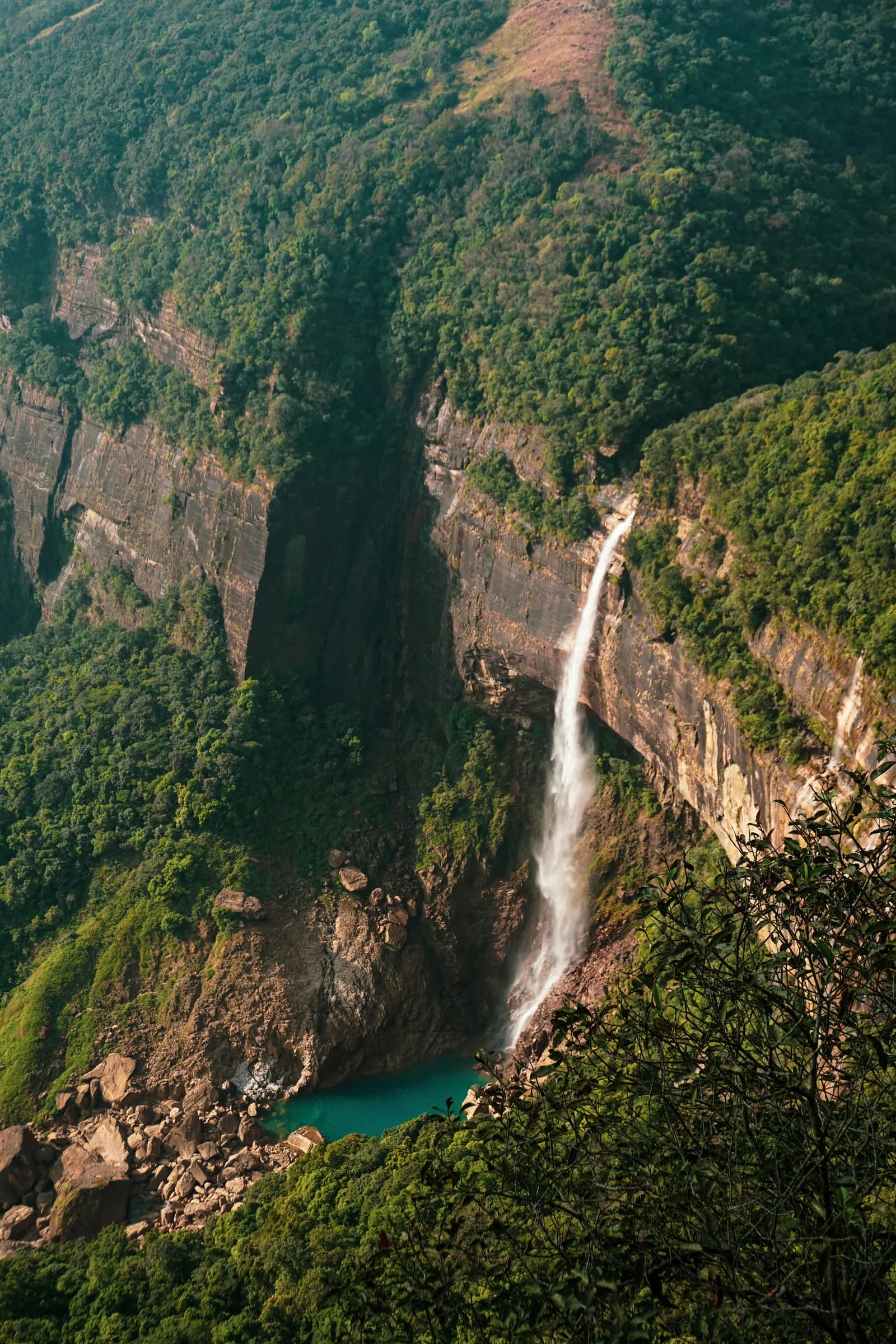 Waterfall in dense rainforest at Sinharaja Forest Reserve, Sri Lanka