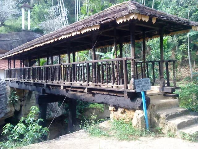 Ancient 16th-century covered wooden roofed bridge spanning the stream at Bogoda near Badulla Sri Lanka